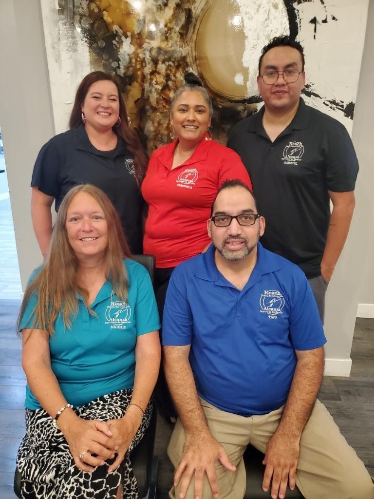 Nicole Miczek Executive Assistant, Tavo Sastre- Executive Director. Back row from left to right- Johanna Grant Group Manager, Veronica Magallanes- Direct Service Program Manager, Gabriel Sastre Events Manager  